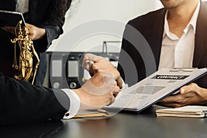 Close up businessman or Lawyer signing contract making a deal, classic business at office