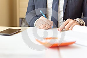 Close up businessman signing documents. Business man signing contract making a deal, classic business.