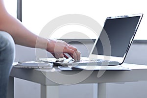Close up.businessman typing on a laptop. photo with text space