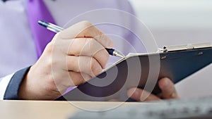 Close-up of businessman using laptop computer