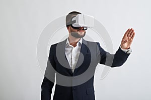Close up of businessman in virtual reality glasses