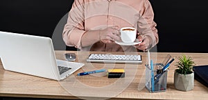 close up of businessman working at office with financial documents chart statistic with laptop