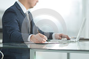 Close up.businessman in the workplace in the office