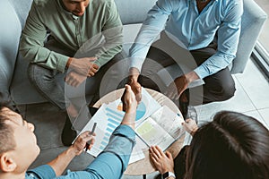 Close up of businessmen hand shake after concluding deal