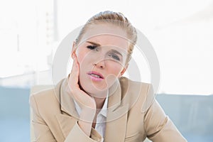 Close up of businesswoman having toothache