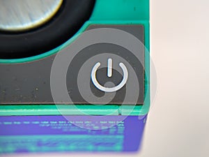 Close up button Power of a speaker bluetooth.
