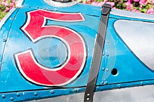 Close up of a 1925 Cadillac Model 314 race car with the number 5 painted on it