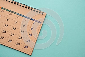 Close up of calendar on green background