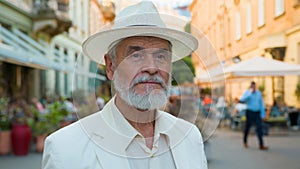 Close up calm old senior 60s elderly mature gray-haired Caucasian elegant man retired businessman intelligent male