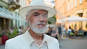 Close up calm old senior 60s elderly mature gray-haired Caucasian elegant man retired businessman intelligent male