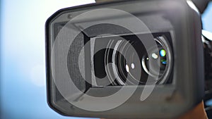 Close-up camcorder lens opens, Zooming Video Camcorder Lens. 4K
