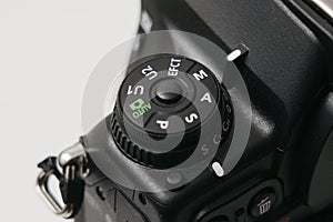 Close up of a camera. mode dial