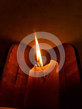 Close up of a candle flame photo