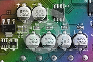 Close up of capacitor on printed computer circuit board