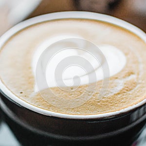 Close up of a cappuccino cup photo