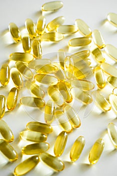 Close up of capsules Omega 3. Health care concept. Medical pill or vitamin's capsule pattern. Medicine, healthcare