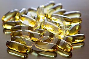 Close up of capsules Omega 3 on white background. Copy space for your text.