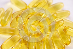 Close up of capsules Omega 3 on white background. Copy space for your text.