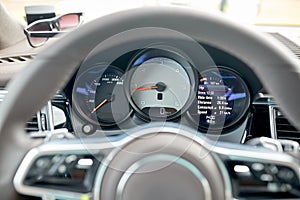 Close up of car dashboard and steering wheel