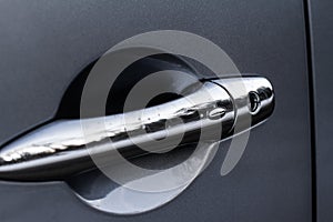 Close up of car door handle.