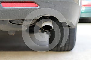 Close up of a car exhaust muffler