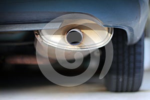 Close up of a car exhaust muffler