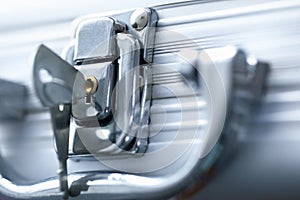 Close-up of a car key inserted in a car door lock