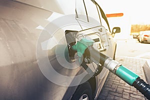 Close up of car refuel in gas station, petrol oil concept