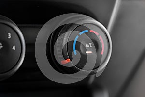 Close-Up of a Car's Air Conditioner Dial
