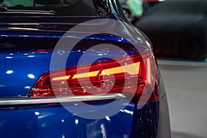 A close-up of a car tail light on a vehicle