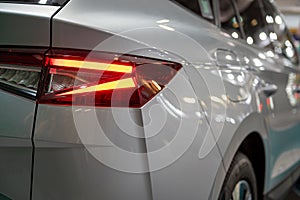 A close-up of a car tail light on a vehicle