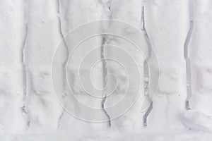 Close up car track in fresh snow background texture