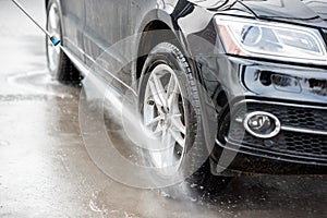 Close-up of a car during the washing process