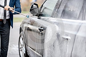 Close-up of a car during the washing process