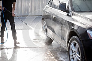 Close-up of a car during the washing process