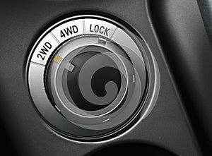 Close up of a car wheel drive control selector