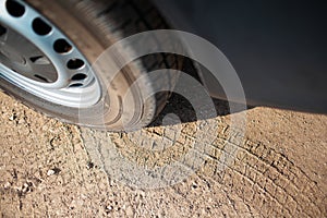 Close-up of car wheel on the road