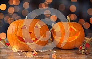 Close up of carved halloween pumpkins on table