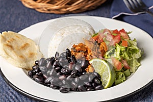 Close up of Casado, typical Costa Rican dish with rice, beans and vegetables