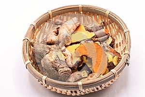 Close up Cassumunar ginger root with slices isolate on white background .