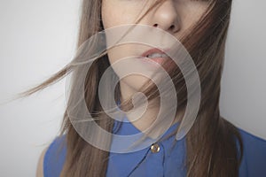 Close up of caucasian young woman. Flying hair.