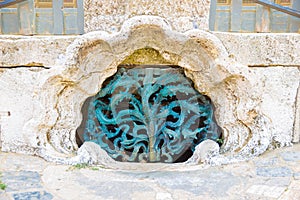 Close up of the central water drain in Piazza del Campo, Siena, Italy