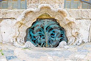 Close up of the central water drain in Piazza del Campo, Siena, Italy