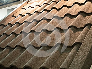 Close-up of ceramic weatherproof roof shingles tiles