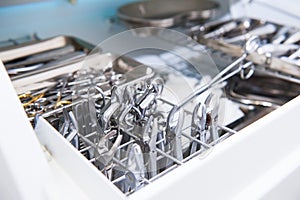 Close-up of chamber for sterile storage of medical and surgical tools in the dentist`s office. Surgery. Dentistry. Selective focus