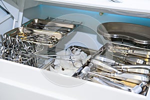 Close-up of chamber for sterile storage of medical and surgical tools in the dentist`s office. Surgery. Dentistry. Selective focus