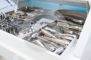 Close-up of chamber for sterile storage of medical and surgical tools in the dentist`s office. Surgery. Dentistry. Selective focus