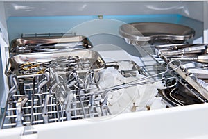 Close-up of chamber for sterile storage of medical and surgical tools in the dentist`s office. Surgery. Dentistry. Selective focus