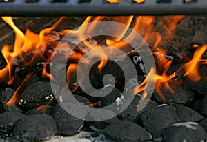 Close-up of Charcoal Briquettes and Flames