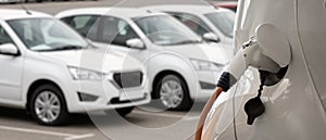 Close-up of a charging electric car